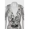Dress with button fastening