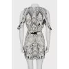 Dress with button fastening