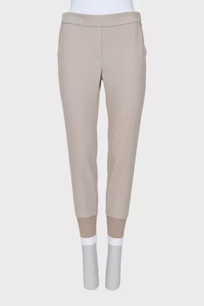 Gray elasticated trousers with pockets