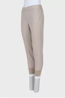 Gray elasticated trousers with pockets
