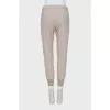 Gray elasticated trousers with pockets