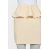 Skirt decorated with a peplum