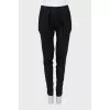 Slim fit trousers with side fastening