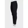 Slim fit trousers with side fastening