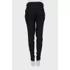 Slim fit trousers with side fastening