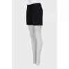 Black shorts with eyelets