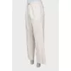Men's beige trousers with tag