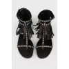 Leather leather sandals with a fringe with a tag