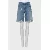 Shorts with a distressed and holed effect