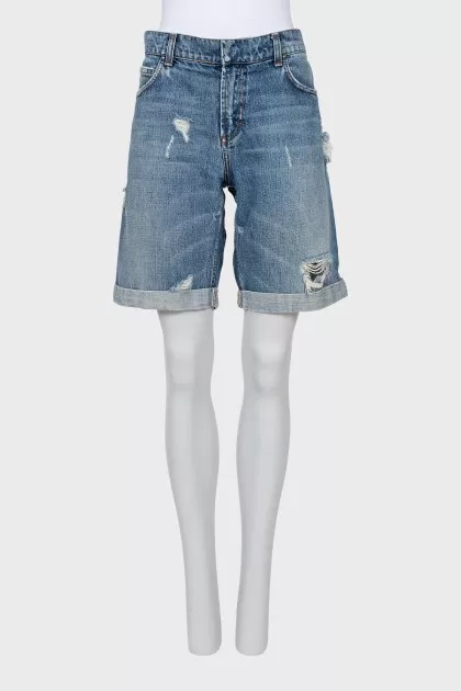 Shorts with a distressed and holed effect