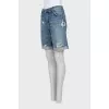 Shorts with a distressed and holed effect