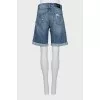 Shorts with a distressed and holed effect