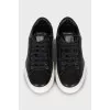 Leather sneakers with signature print