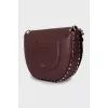 Dark red bag with metallic decor
