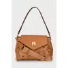 Brown bag with signature print