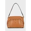 Brown bag with signature print