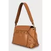 Brown bag with signature print