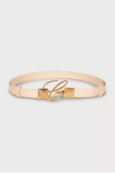Leather belt with gold buckle