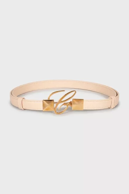 Leather belt with gold buckle