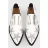 Shoes with embroidery stars with a tag