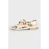 Pearl shoes with a tag
