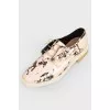 Pearl shoes with a tag