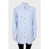 Shirt with asymmetrical pocket