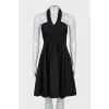 Fitted dress with open shoulders