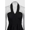 Fitted dress with open shoulders