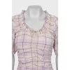Plaid dress with draping