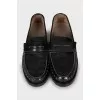 Brown leather loafers
