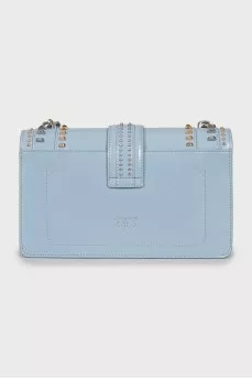 Blue bag with metallic decor