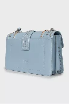 Blue bag with metallic decor