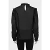 Black blouse with embroidery and frills