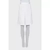 White skirt with gold fittings