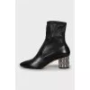 Leather ankle boots with silver heels