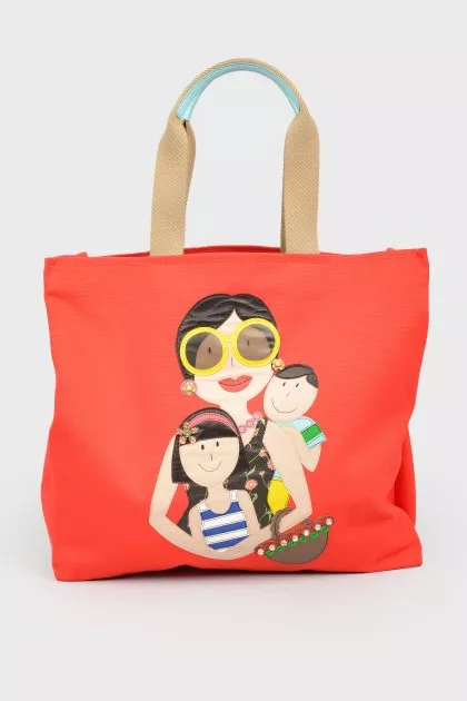 Red shopper with a print with a tag