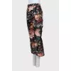 Black floral print trousers with tag