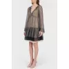 Translucent dress on a beige lining with a tag