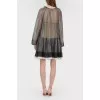 Translucent dress on a beige lining with a tag