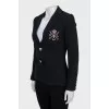 Jacket with signature embroidery