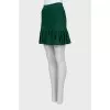 Green pleated skirt