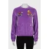 Purple sweatshirt with embroidery