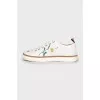Leather sneakers with floral embroidery