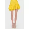 Mini-skirt with ruffles tag