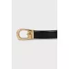 Black leather belt with gold buckle