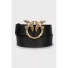 Black leather belt with gold buckle