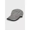 Black and white cap with signature monogram