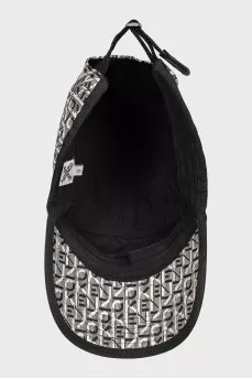 Black and white cap with signature monogram