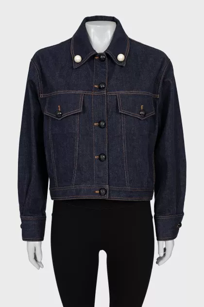 Denim jacket decorated with beads